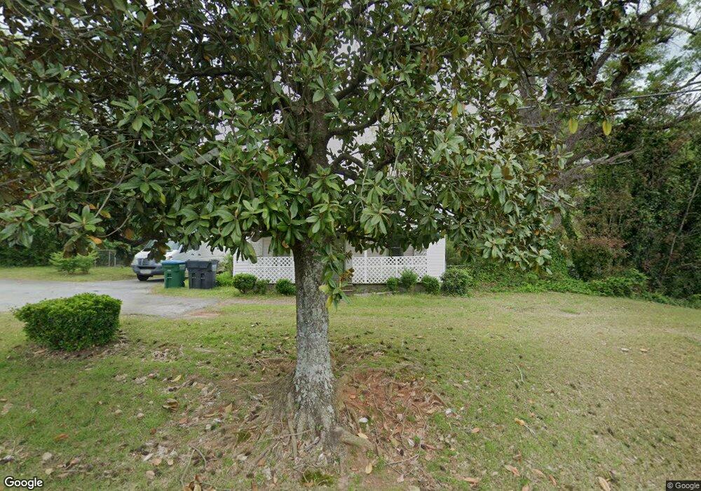 1677 Hewatt Rd SW, Lilburn, GA 30047 - photo 1