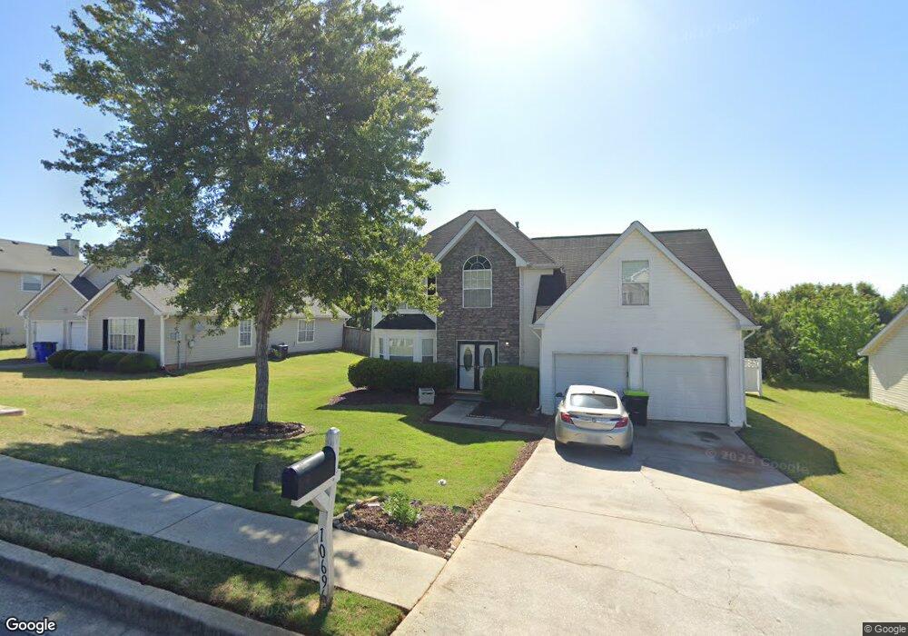 10696 Village Crossing unit 3, Jonesboro, GA 30238 - photo 1