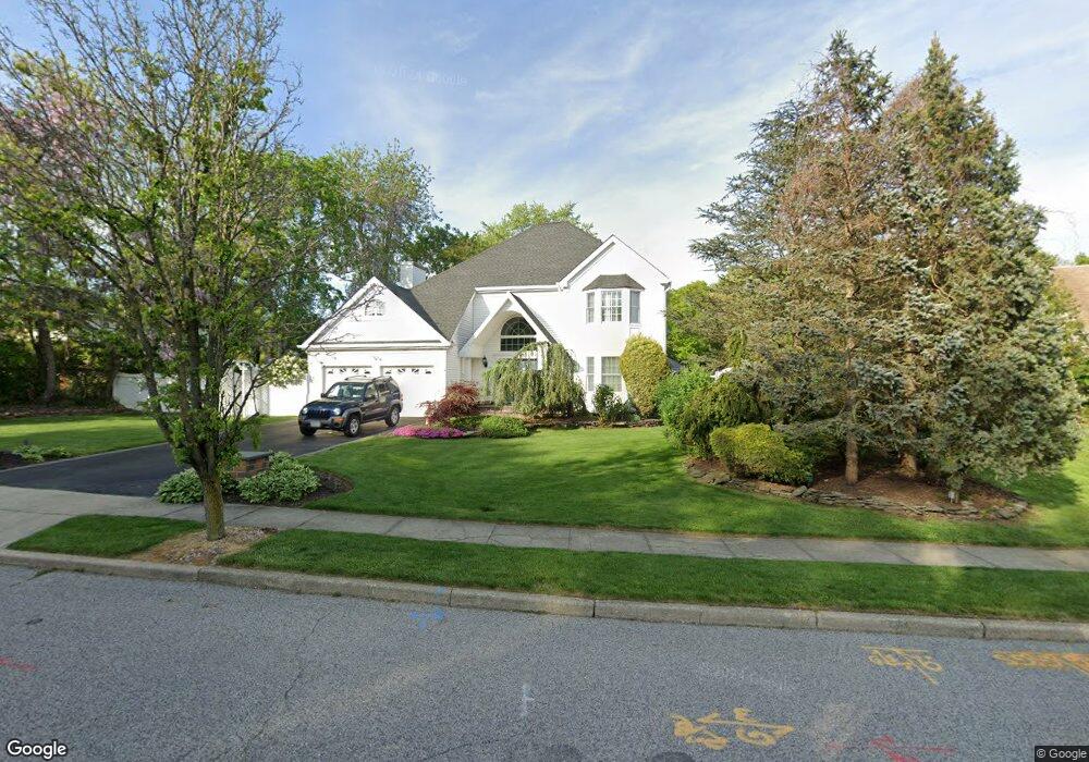 99 Caramel Rd, ComMacK, NY 11725 - photo 1