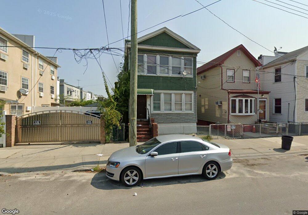 9711 87th St, Ozone Park, NY 11416 - photo 1