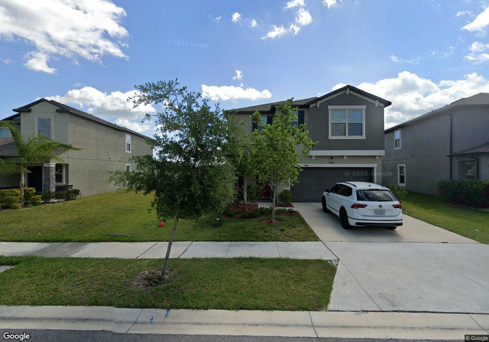 31246 Barrel Wave Way, Wesley Chapel, FL 33545 - photo 1