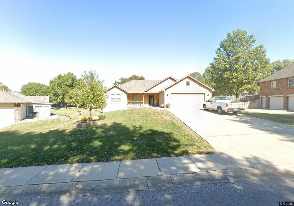 616 W Maple St, Raymore, MO 64083 - photo 1