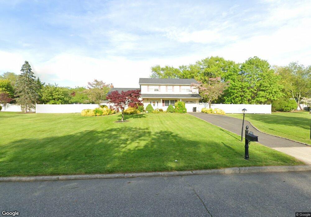 119 Caramel Rd, ComMacK, NY 11725 - photo 1