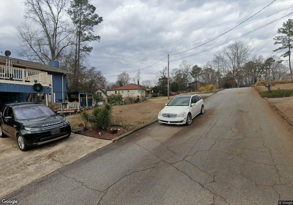 656 E East Riverbend Ct, Lilburn, GA 30047 - photo 1