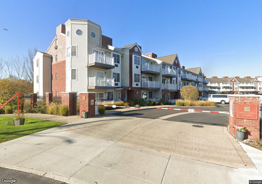 9428 Magnolia Ct unit 1A, Ozone Park, NY 11417 - photo 1