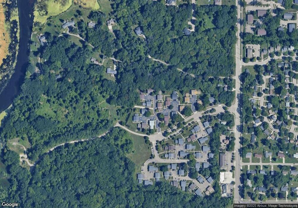 3942 Hunters Ridge Dr unit 4, Lansing, MI 48911 - photo 1