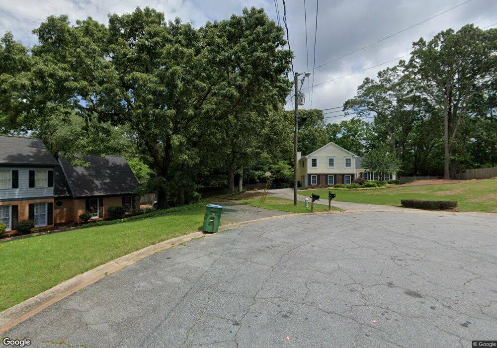 1406 Manchester Ct SW, Lilburn, GA 30047 - photo 1