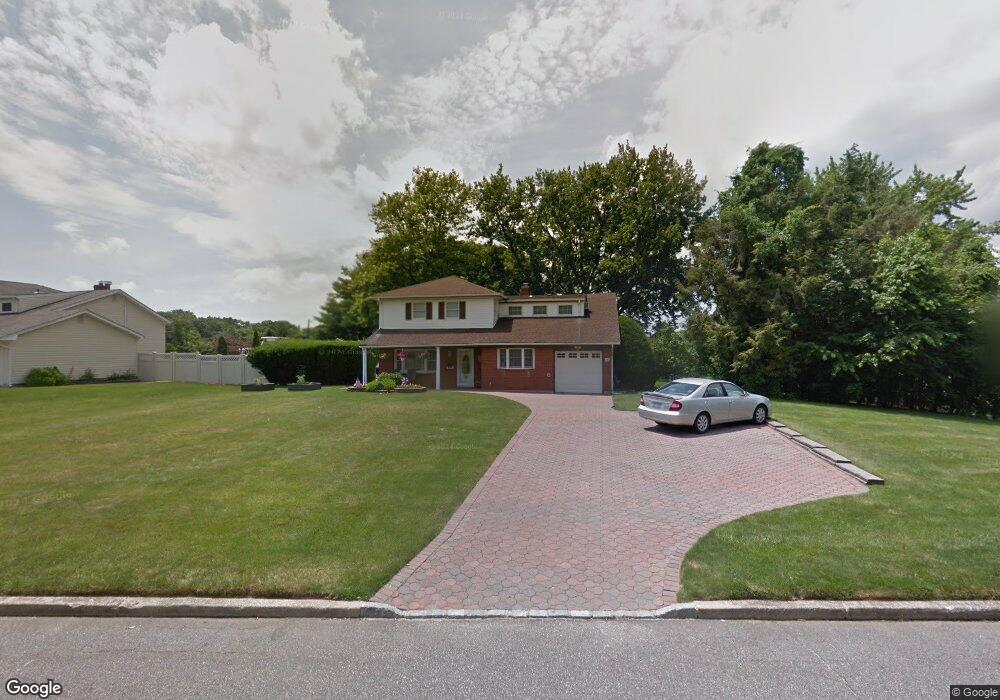 106 Caramel Rd, ComMacK, NY 11725 - photo 1