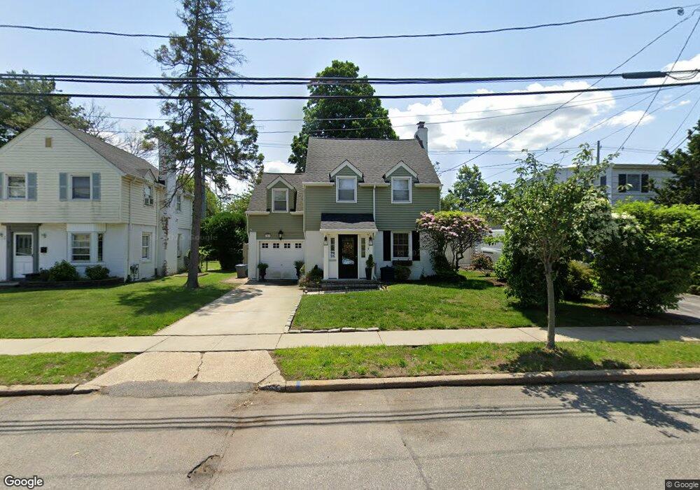 317 De Mott St, Mineola, NY 11501 - photo 1