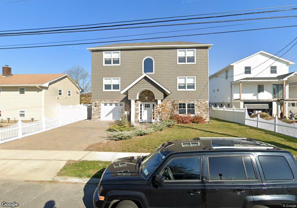 137 Trafalgar Blvd, Island Park, NY 11558 - photo 1