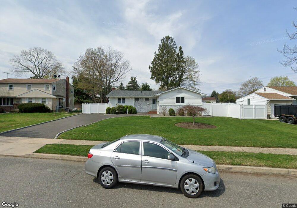 56 Ruth Blvd, ComMacK, NY 11725 - photo 1