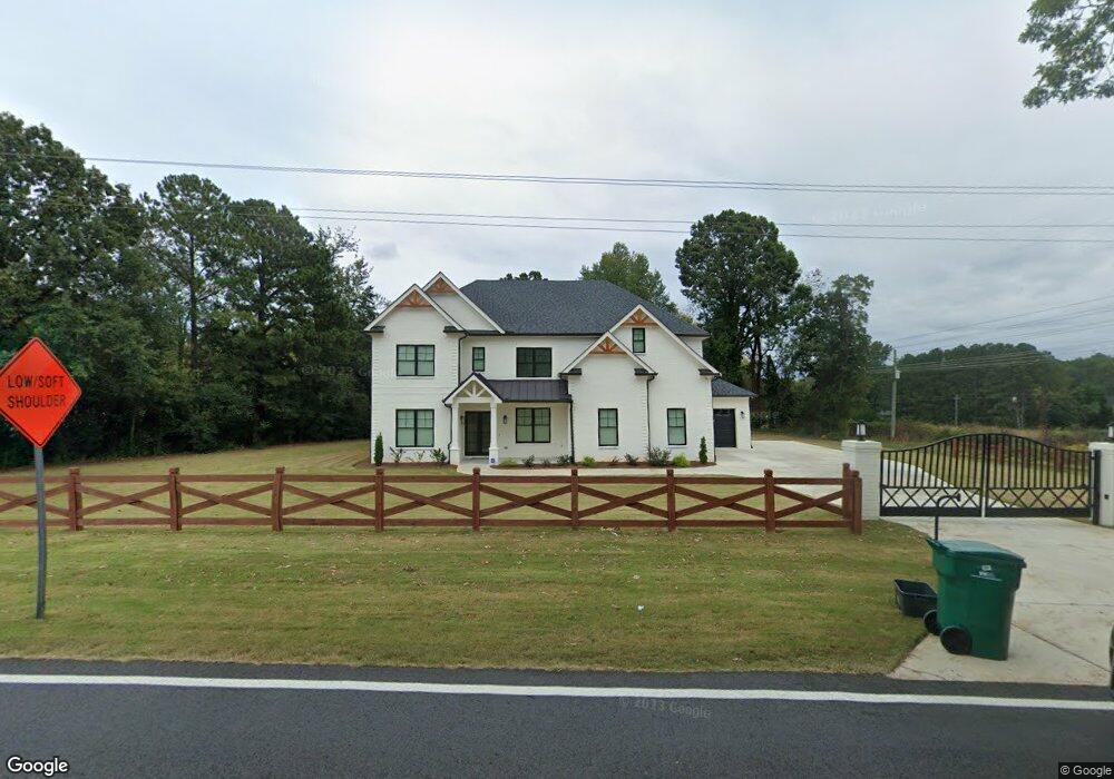 4950 Lilburn Stone Mountain Rd SW, Lilburn, GA 30047 - photo 1