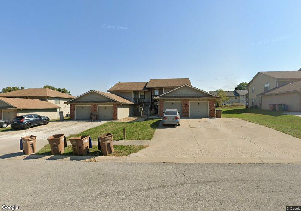 303 Sky Vue Dr, Raymore, MO 64083 - photo 1