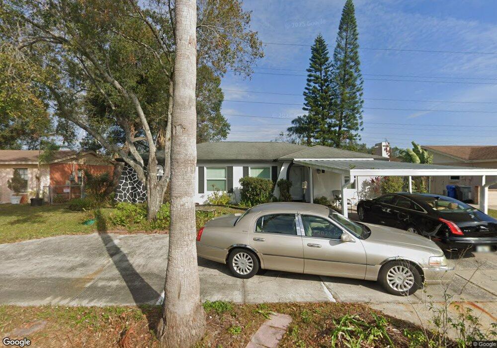 8614 Wood Ridge Rd, Tampa, FL 33619 - photo 1