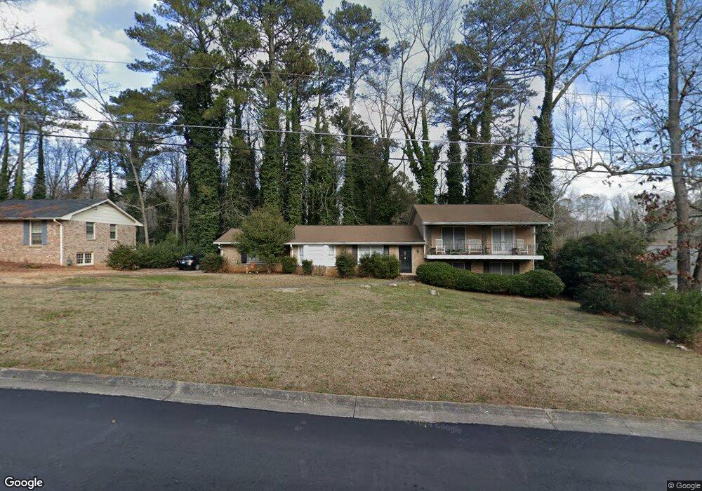 390 Village Green Ct SW unit 1, Lilburn, GA 30047 - photo 1