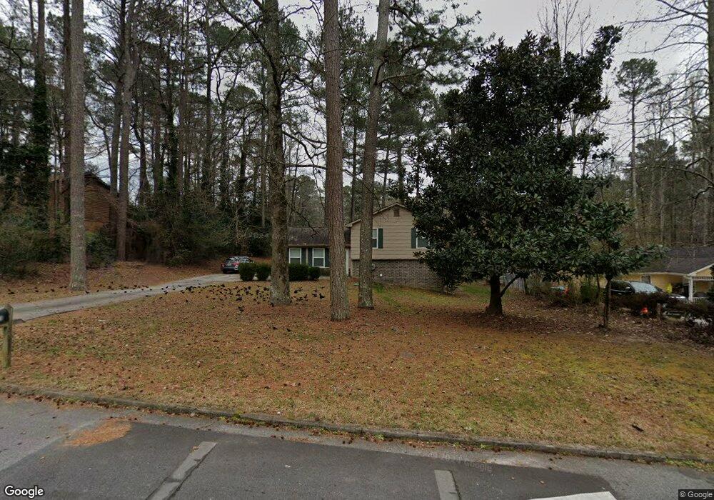 2776 Spanish Oak Dr SW, Lilburn, GA 30047 - photo 1