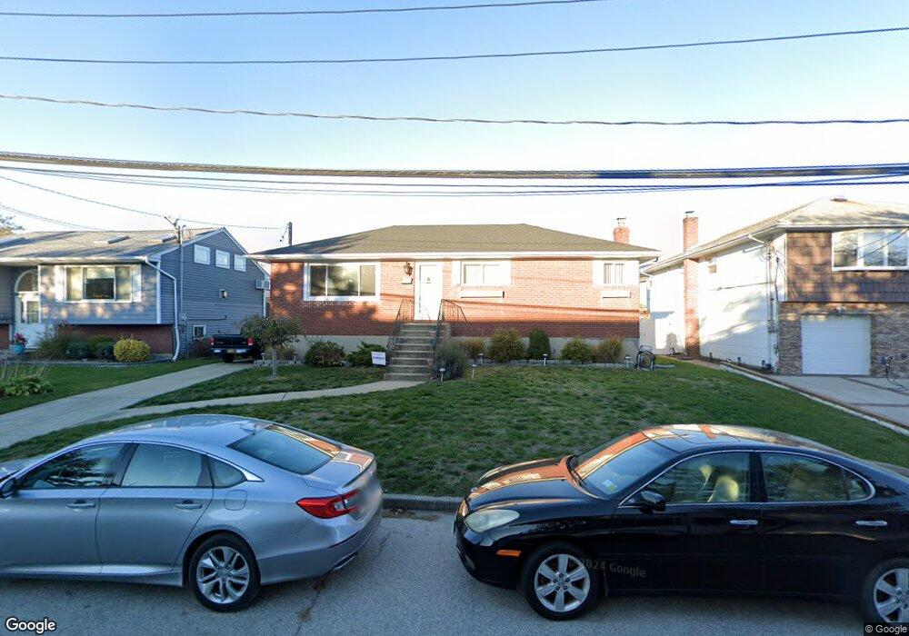 145 Baker Ct, Island Park, NY 11558 - photo 1