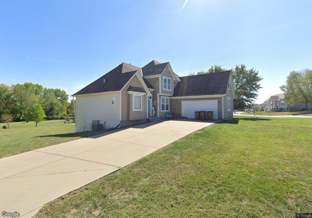 1403 Essex Ct, Raymore, MO 64083 - photo 1