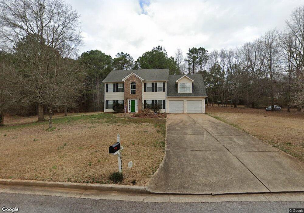 1005 Miss Amber Way unit 22, Locust Grove, GA 30248 - photo 1