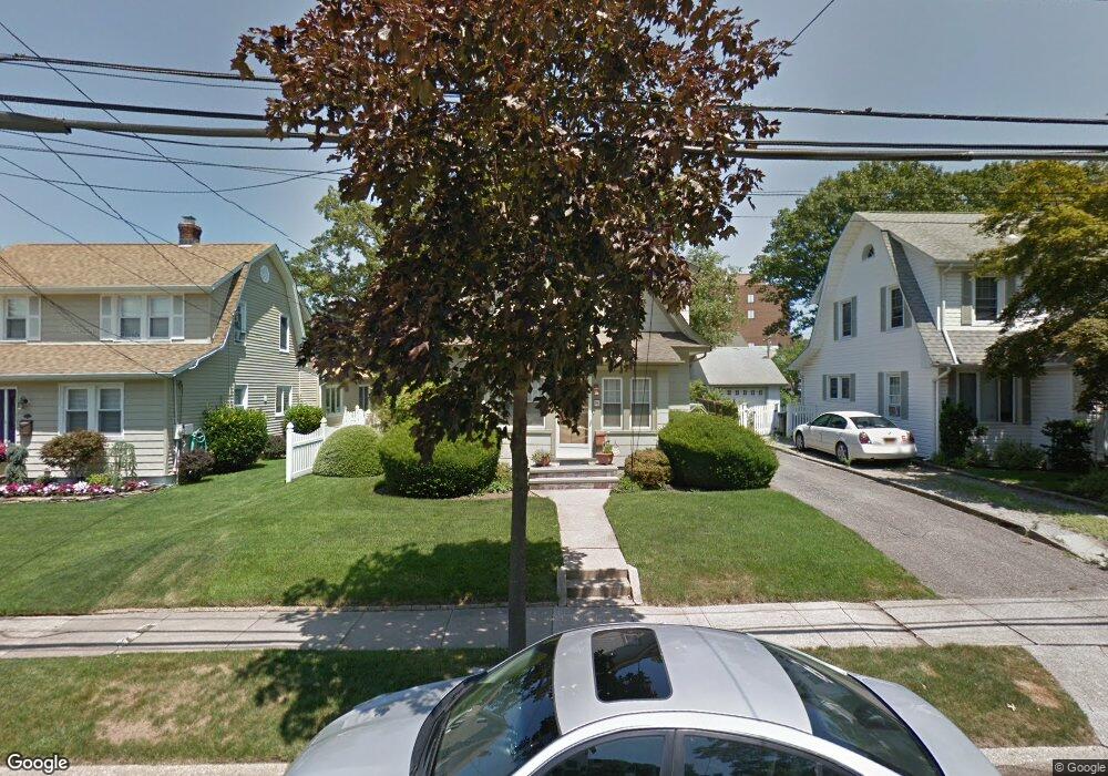 96 Woodnut Place, Mineola, NY 11501 - photo 1