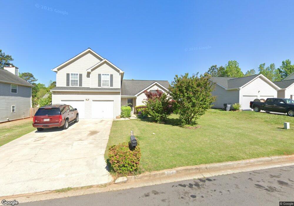 10683 Village Crossing unit 3, Jonesboro, GA 30238 - photo 1