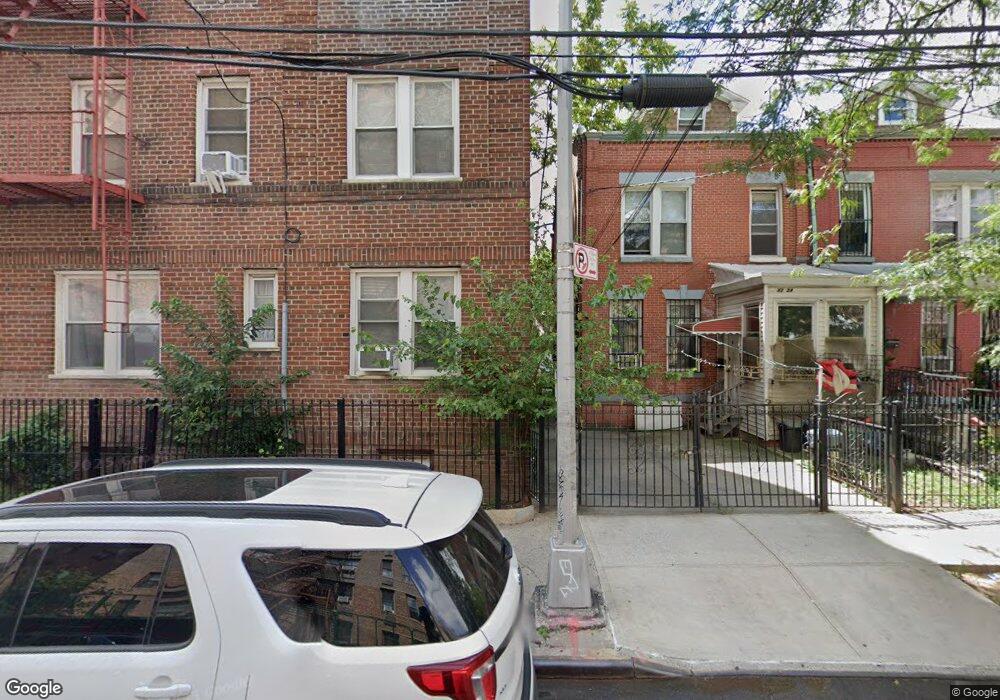 4234 Ithaca St, Elmhurst, NY 11373 - photo 1