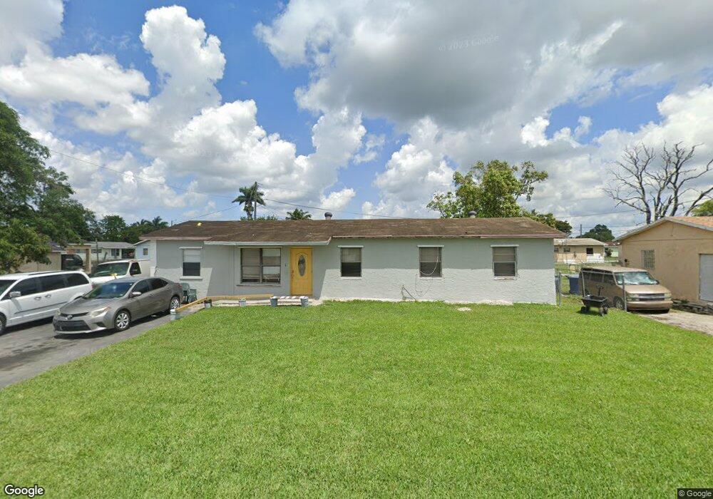 1248 Vaughn Cir, Belle Glade, FL 33430 - photo 1