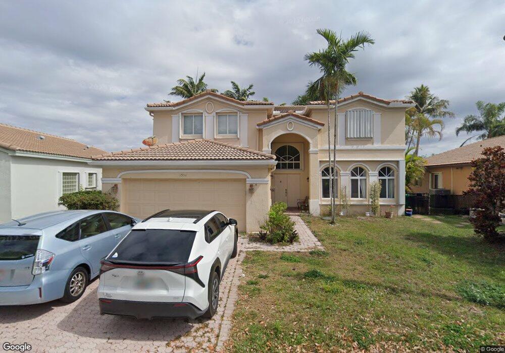 1554 E Harmony Lake Cir, Davie, FL 33324 - photo 1