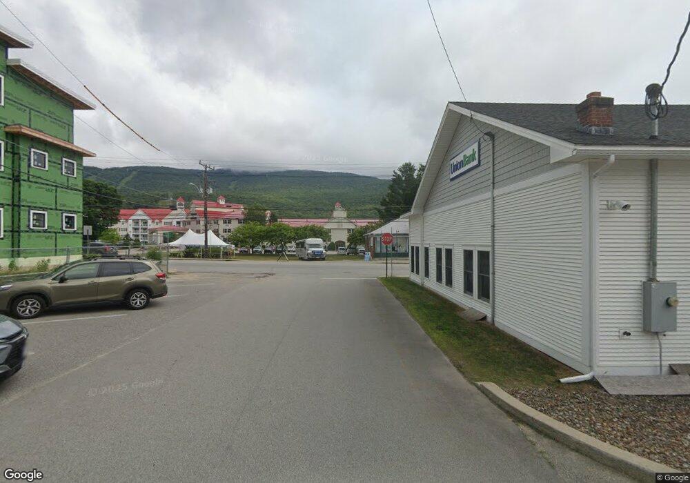 63 Coolidge St unit A, Lincoln, NH 03251 - photo 1