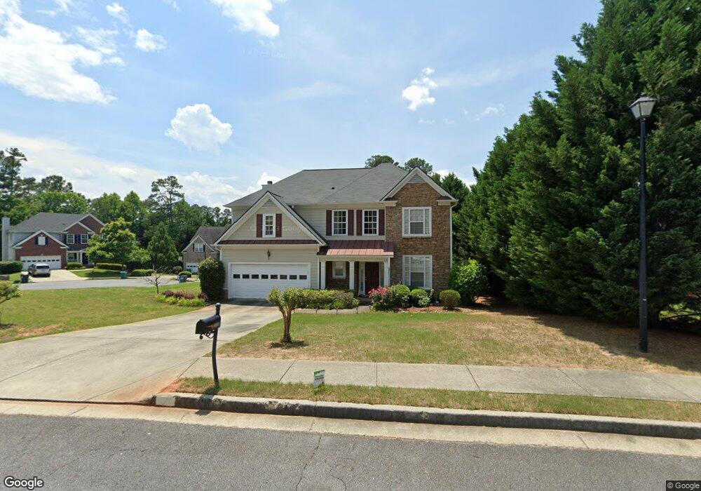 1885 Embassy Walk Ln, Lilburn, GA 30047 - photo 1