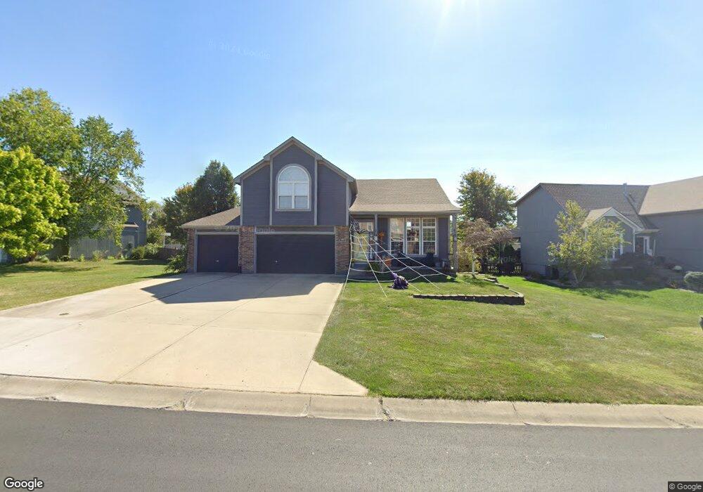 1511 Saddlebrook Rd, Raymore, MO 64083 - photo 1