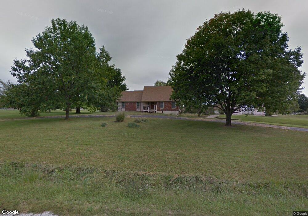 1303 E Meadow Brook Dr, Raymore, MO 64083 - photo 1