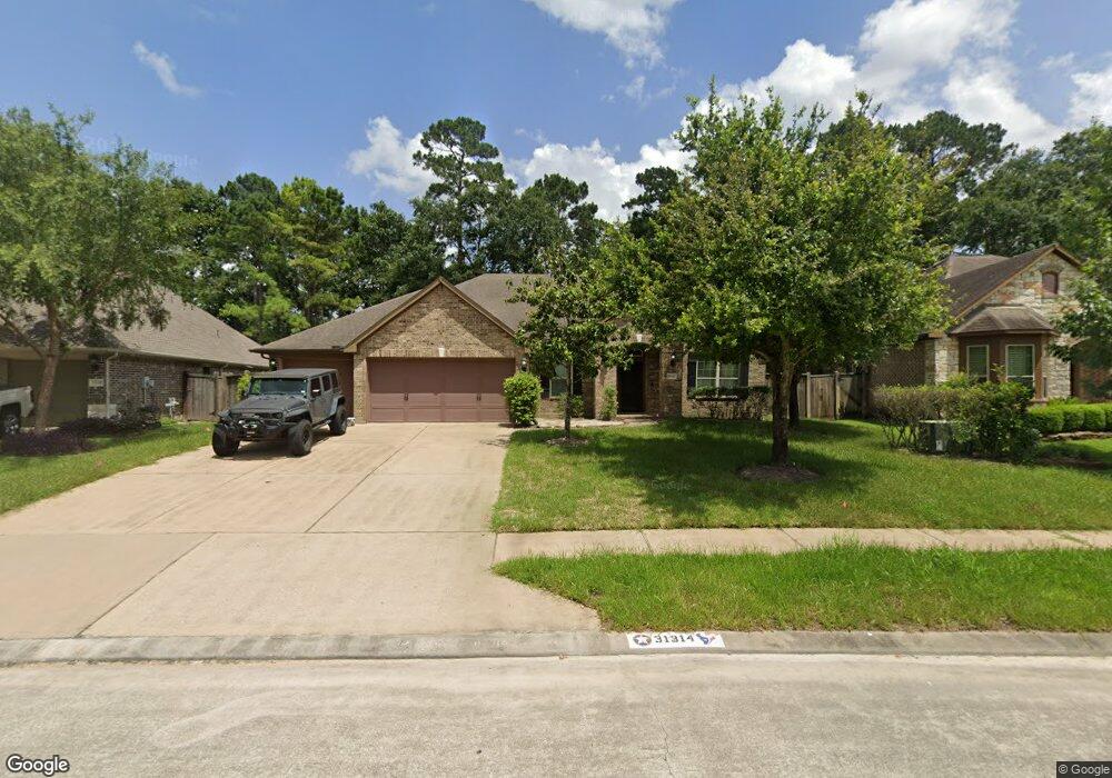 31314 Whispering Oaks Ln, Spring, TX 77386 - photo 1