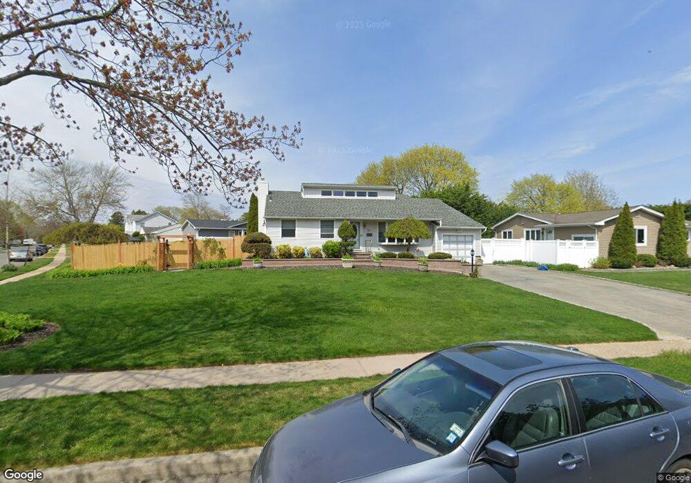 62 Ruth Blvd, ComMacK, NY 11725 - photo 1