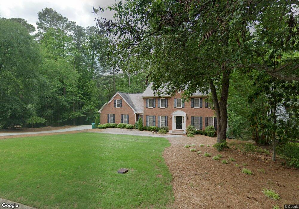 1441 Rainbrook Ct SW, Lilburn, GA 30047 - photo 1