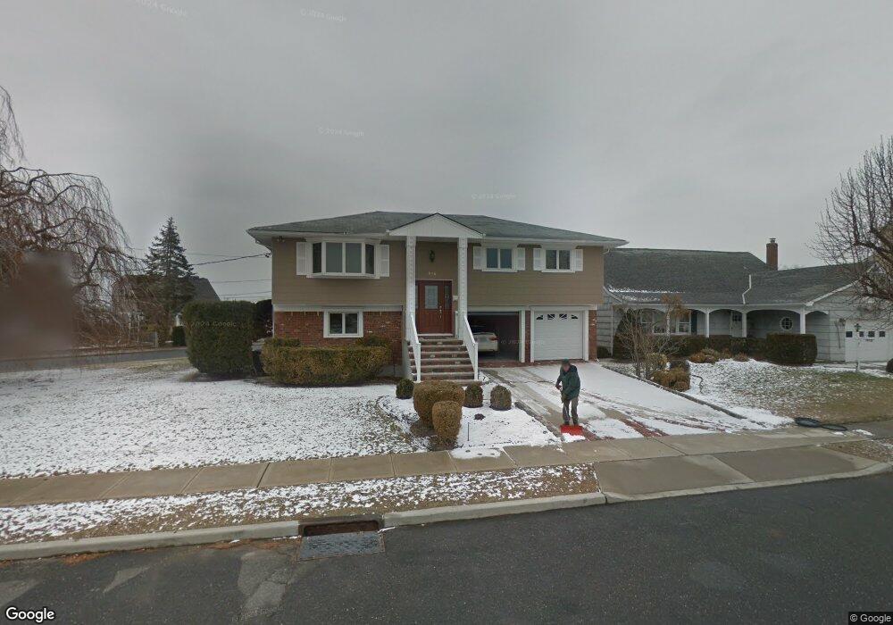 216 Morningside Ave, Island Park, NY 11558 - photo 1