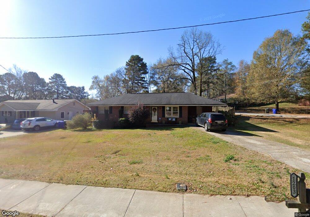 1203 Eastview Rd NE, Conyers, GA 30012 - photo 1