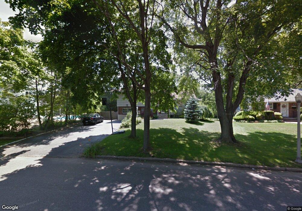 56 Elder Dr, ComMacK, NY 11725 - photo 1