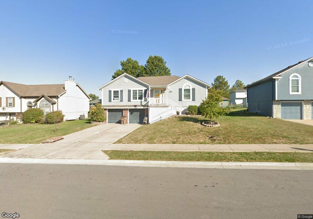 1702 Johnston Dr, Raymore, MO 64083 - photo 1