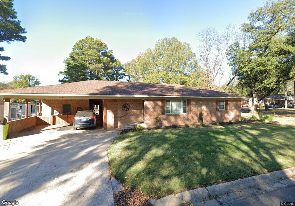 1204 W 16th St, Stuttgart, AR 72160 - photo 1