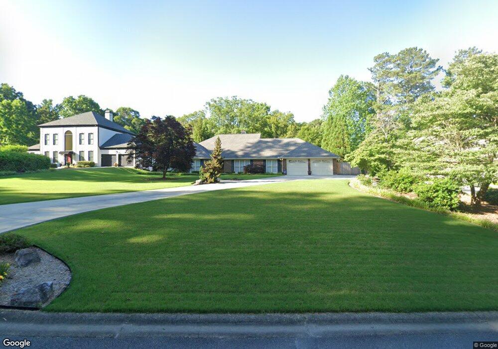 5011 Carriage Lakes Dr NE unit 1, Roswell, GA 30075 - photo 1
