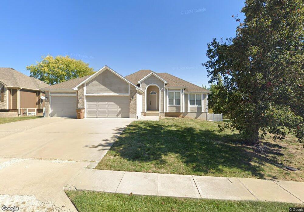 1302 Haystack Rd, Raymore, MO 64083 - photo 1