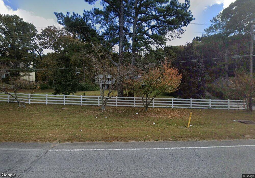 1408 Hewatt Rd SW, Lilburn, GA 30047 - photo 1