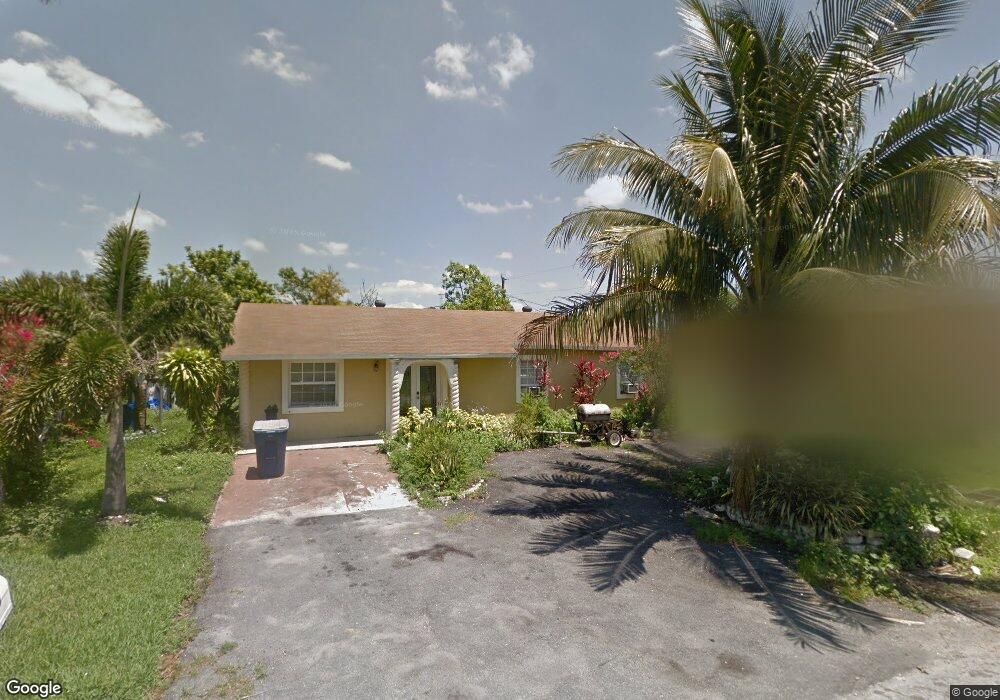 1217 Vaughn Cir, Belle Glade, FL 33430 - photo 1