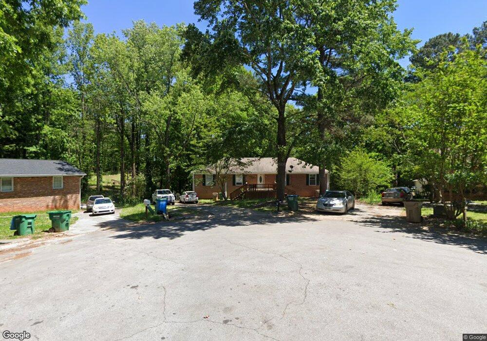 5556 Rock Garden Ct NW unit B, Lilburn, GA 30047 - photo 1