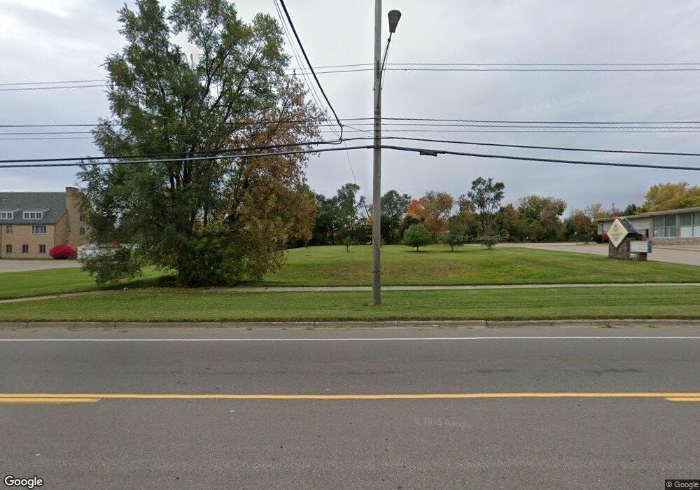 633 W Jolly Rd, Lansing, MI 48910 - photo 1