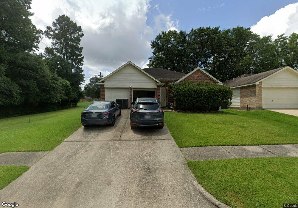 9812 Woodhollow Dr, Conroe, TX 77385 - photo 1