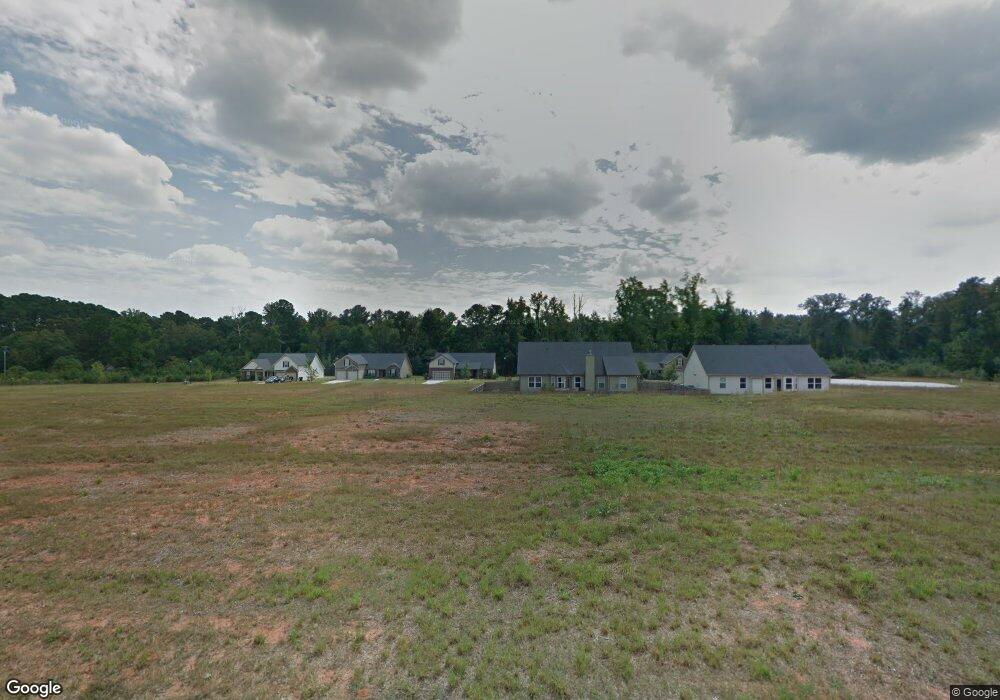 609 Winners Cir unit 110, Locust Grove, GA 30248 - photo 1