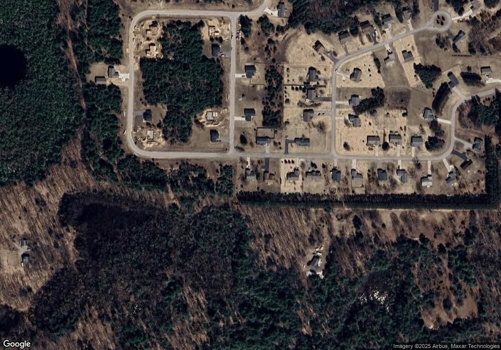 6321 Jeffrey Place unit 20, Grawn, MI 49637 - photo 1