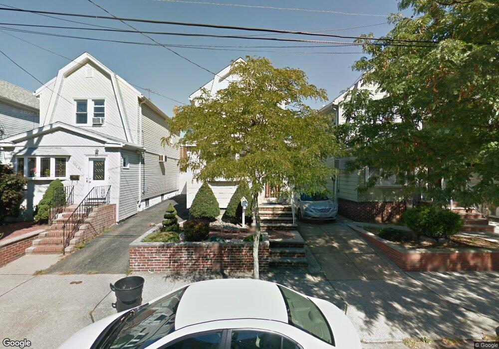 10729 87th St, Ozone Park, NY 11417 - photo 1